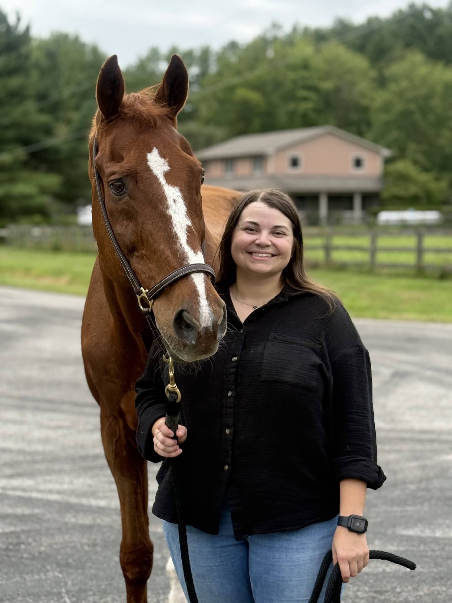 Nichole Binkoski with her chestnut OTTB