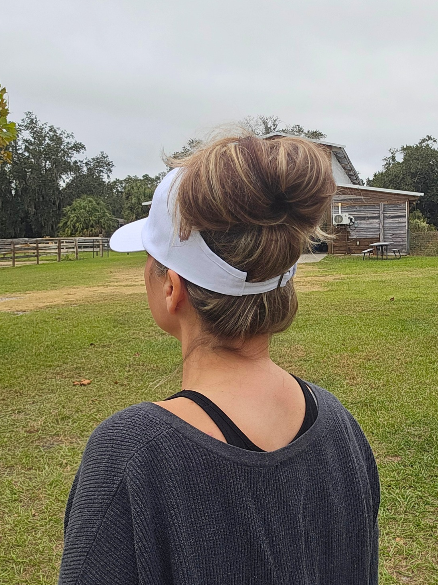 Improve Equine Messy Bun Ball Cap, back view showing the open adjustable back for a high bun