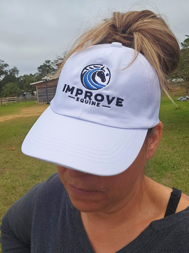 Improve Equine Messy Bun Ball Cap, front view with Improve Equine logo
